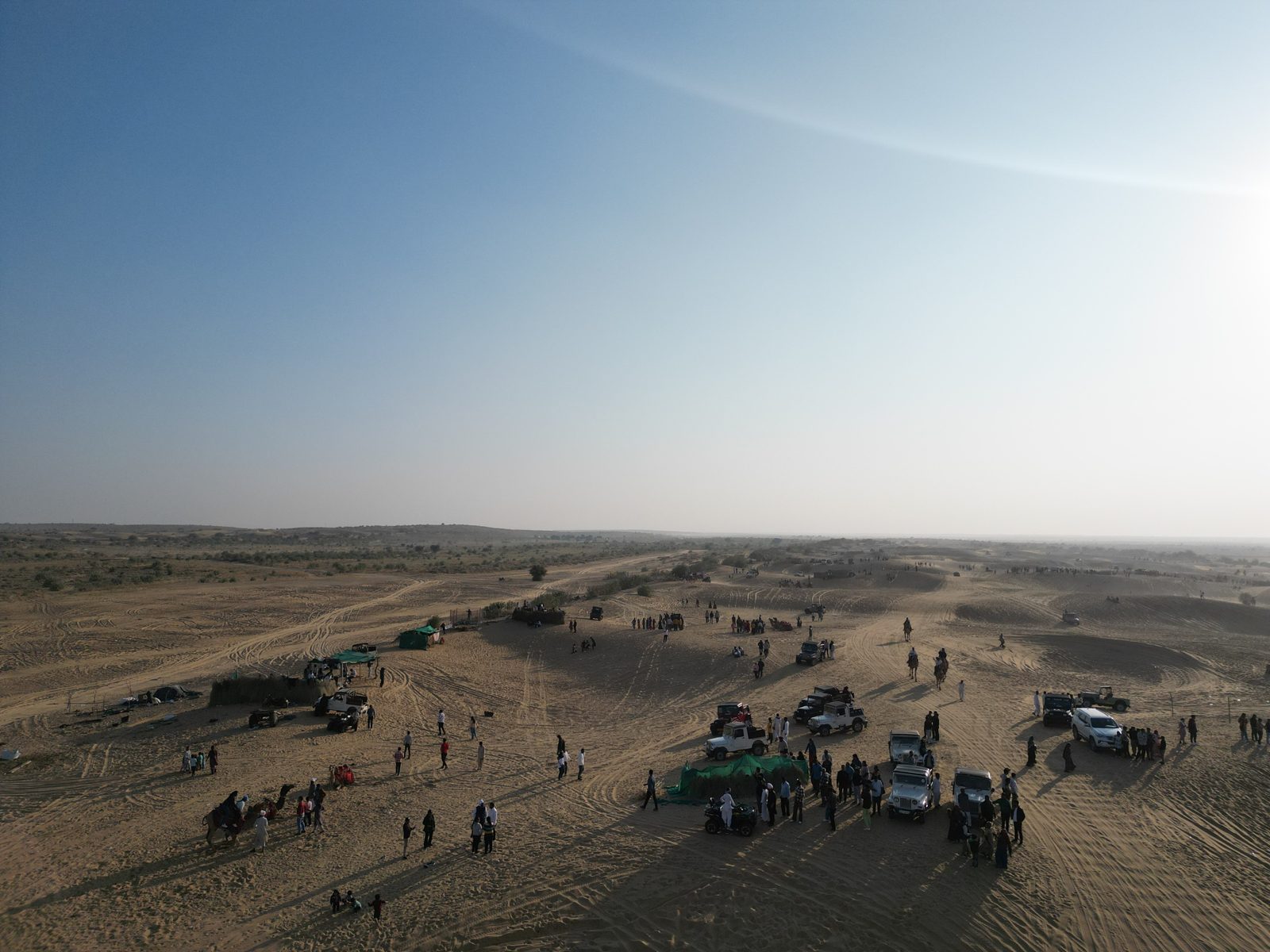 Jeep safari and camel rides among the Sam sand dunes near Jaisalmer in the evening light